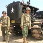 WW2 Cat tractor in poignant Normandy return River-walk