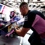 SportPesa racing point f1 puts JCB tools to the test