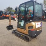 Going for gold: eye-catching excavator helps raise funds for charity