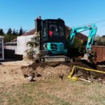 Kobelco mini helps keep spirits up by creating back garden dirt track