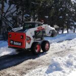 Bobcat machines excel in Madrid snow clear up operation