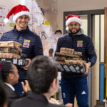 Olympic heroes deliver gifts donated to JCB Christmas Toy Appeal