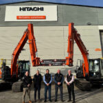 Hitachi Construction Machinery UK celebrates 20 years at HQ L-R: Mark Turnham (national director of sales and marketing); Andrew Shield (chief finance officer); Toshitaka Uchida (chairman); Jim Marshall (production director); and David Roberts (CEO)