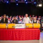 Choir hits the right note to boost JCB’s NSPCC Appeal JCB Christmas event