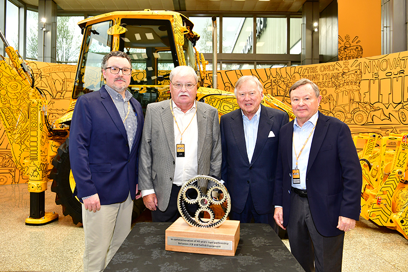 L-R: Sellick Equipment president Colin Sellick; co-founder Howard Sellick; JCB chairman Anthony Bamford; and Sellick Equipment co-founder David Sellick