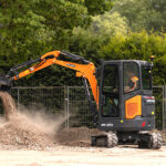 Develon adds to mini-excavator portfolio Mini-excavator on construction site