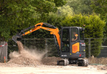 Develon adds to mini-excavator portfolio Mini-excavator on construction site