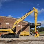Full rebuild extends the reach of game-changing excavator Long-reach Cat excavator