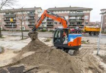 Electric digger charges ahead with town centre regeneration Compact electric excavator