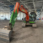 Construction tech drives efficiencies at BMW plant upgrade Excavator at work at new BMW facility