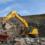 Historic Campbeltown firm makes landmark tracked excavator purchase Tracked excavator working in hard rock quarry