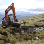 Plant operators rise to Scotland’s peatland challenge Excavator being utilised in peatland restoration work