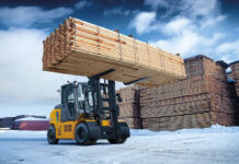 Hyundai launches new electric forklift range Electric forklift lifting lumber