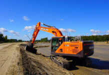 Develon smart safety features put to the test in French field demo Crawler excavator on construction site