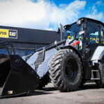 Finning outdoor cinema set to put PlantWorx visitors in the picture Cat 444 centennial backhoe loader