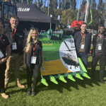 Miller UK and Flannery Plant Hire celebrate success of charity bucket auction Miller & Flannery team with charity bucket at PlantWorx