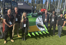 Miller UK and Flannery Plant Hire celebrate success of charity bucket auction Miller & Flannery team with charity bucket at PlantWorx