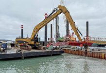 ‘Reaching’ far afield with specialist plant Breaking out rock with Cat 385 to achieve depth required at Grutness Ferry Terminal