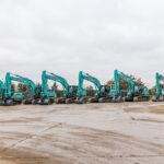 Construction group seals 32-machine Kobelco haul in £4.5m deal Kobelco excavators in a plant yard