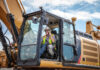 Route to net zero starts with cost-saving tech Construction operator in an excavator