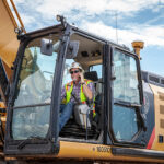Route to net zero starts with cost-saving tech Construction operator in an excavator