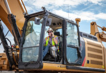 Route to net zero starts with cost-saving tech Construction operator in an excavator