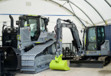 Finning presents Flannery with rare Centennial Grey machines Grey machinery to mark Caterpillar centenary