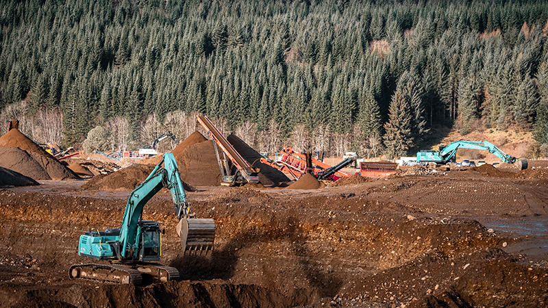 Construction machines on golf course project