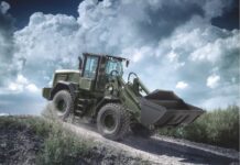 JCB to supply US military with 535 machines Militarised vehicle on dirt hill
