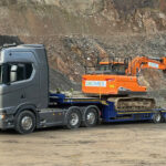 Inverness firm sees efficiency gains after implementing Podfather software Construction machine on haulage vehicle