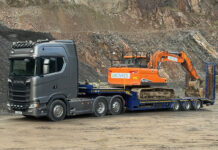 Inverness firm sees efficiency gains after implementing Podfather software Construction machine on haulage vehicle