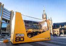 JCB digger was boxing clever on Valentine’s Day outside railway station JCB backhoe in a box outside railway station