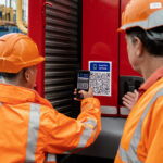ScotPlant visitors to get sneak peek of new hire software Construction workers scanning QR code to access digital data
