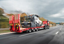 King Trailers are in for the long haul Trailer transporting construction machine