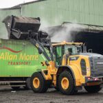 High-lift loader proves its worth at composting plant Wheel loader at recycling facility