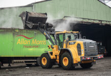High-lift loader proves its worth at composting plant Wheel loader at recycling facility