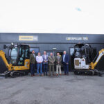 Killin organisation wins Cat excavator in centenary competition Group shot of Finning competition winners