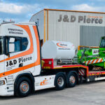 Merlo models show their steel on major schemes Merlo telehandler on lorry