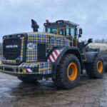 Tartan-branded loading shovel to raise money for MND research at ScotPlant 2026 Loading shovel in Doddie Weir tartan