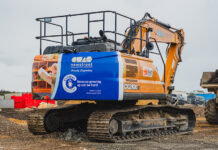 Construction partners join forces to support children’s charity CASE excavator featuring charity branding