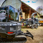 Black and grey minis stand out in Kubota forestry fleet Black and grey painted mini-excavators