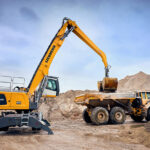 Three-year pilot highlights benefits of fleet management solution A Liebherr material handler and Volvo articulated hauler from the SER fleet.
