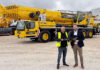 Growing crane firm snap up milestone five-axle all-terrain model Richard Foster (24/7 Crane Hire) and Lyle Sibbald (Liebherr Great Britain)