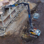 Collins Demolition snaps up UK’s first Volvo EC500HR High reach excavator helping to dismantle council building