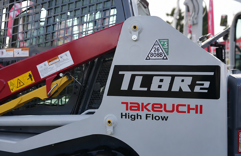 Construction machine with CESAR Scheme label