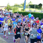 Runners beat the heat in JCB race and fun run event Runners take off at JCB event