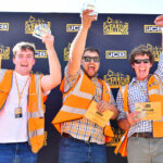 JCB crowns 2026 Operator of the Year L-R: Lewis Cameron, Tom Balls, and Ollie Gunns