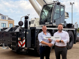 Bernard Hunter secures first 90-tonne rough-terrain crane Mark Rafferty (Bernard Hunter Cranes) and Lyle Sibbald (Liebherr Great Britain)