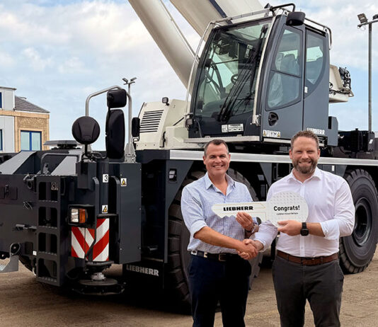 Bernard Hunter secures first 90-tonne rough-terrain crane Mark Rafferty (Bernard Hunter Cranes) and Lyle Sibbald (Liebherr Great Britain)