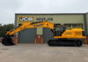 AMD snaps up first JCB 420X tracked excavator in Scotland JCB excavator outside Scot JCB's HQ with AMD livery